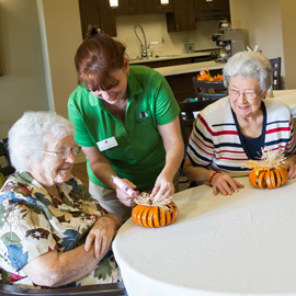 Friendly staff attending happy residents